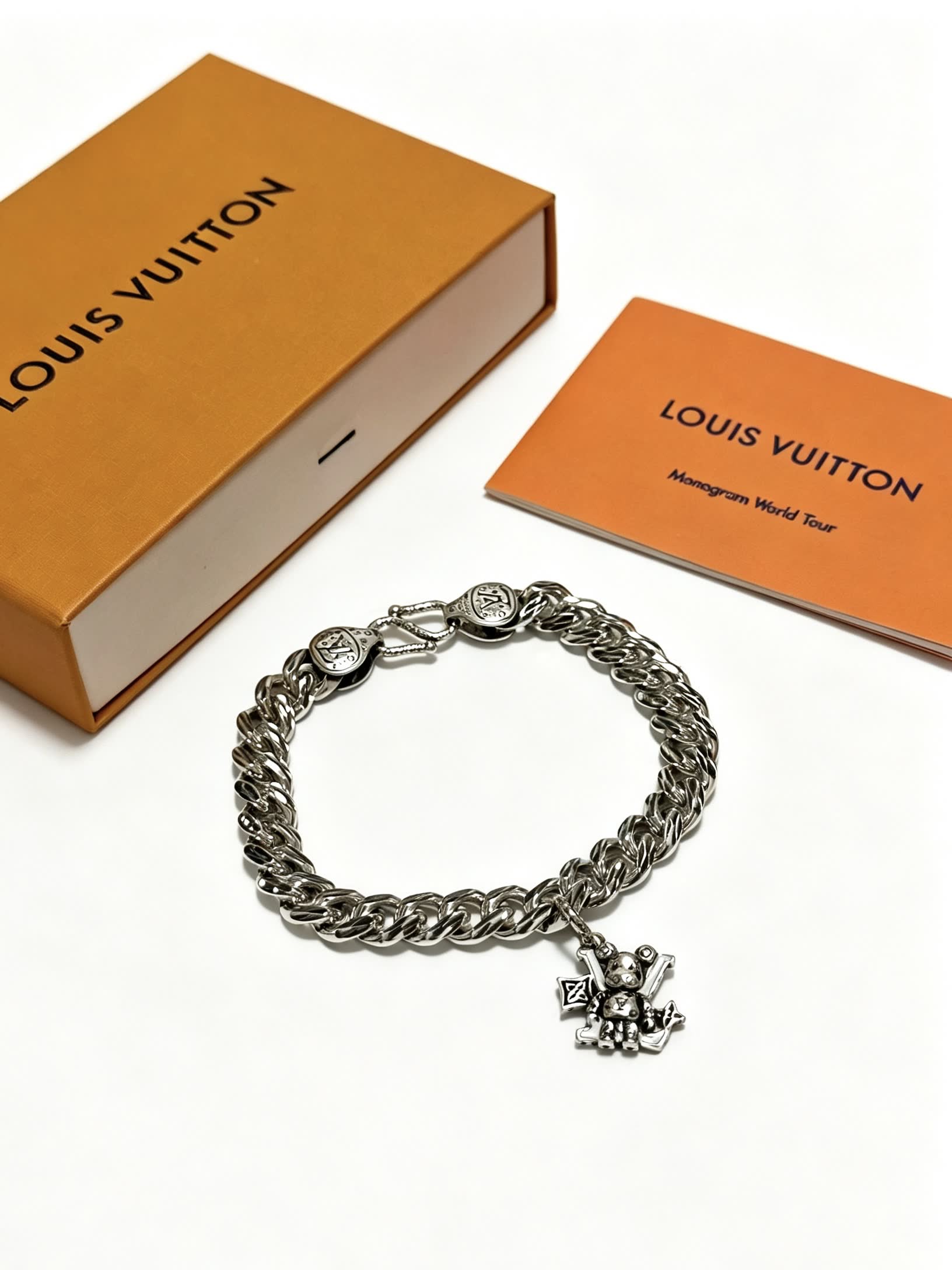 Louis Vuitton Silver Tone Bracelet with Monogram Charm